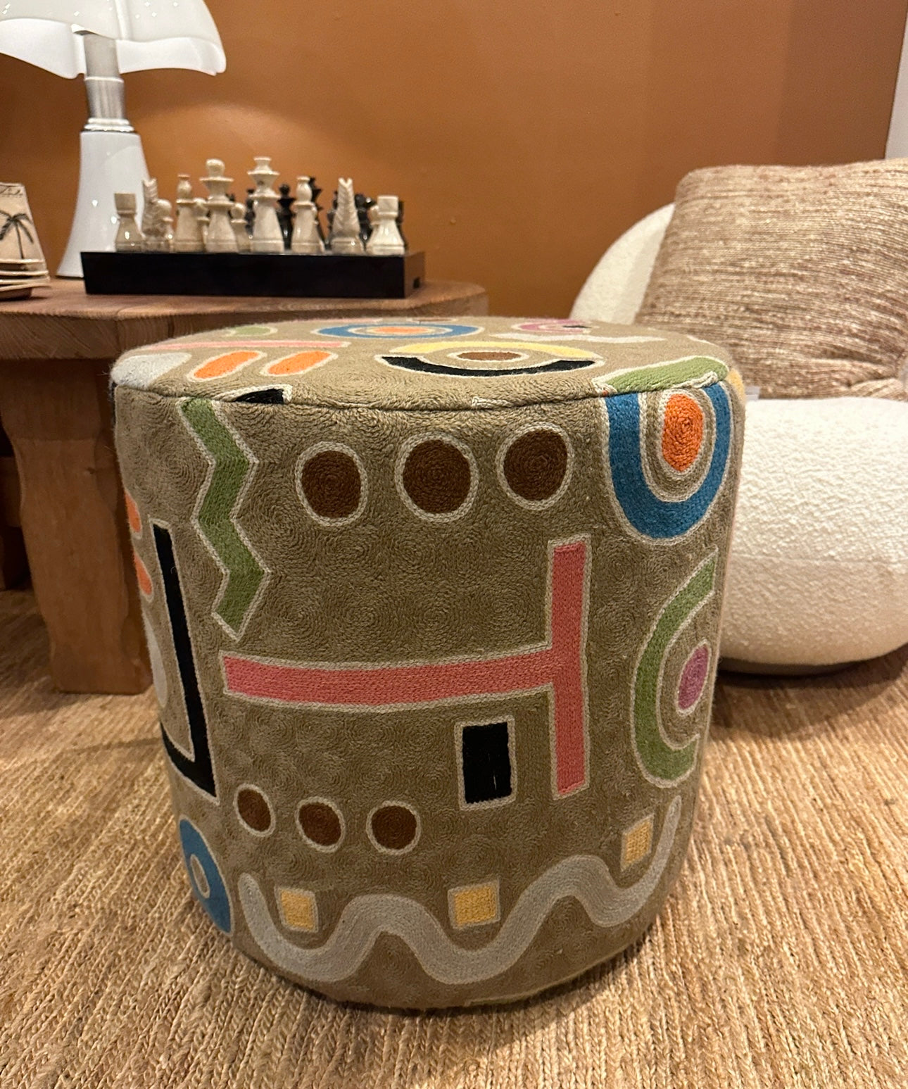 Embroidered pouf