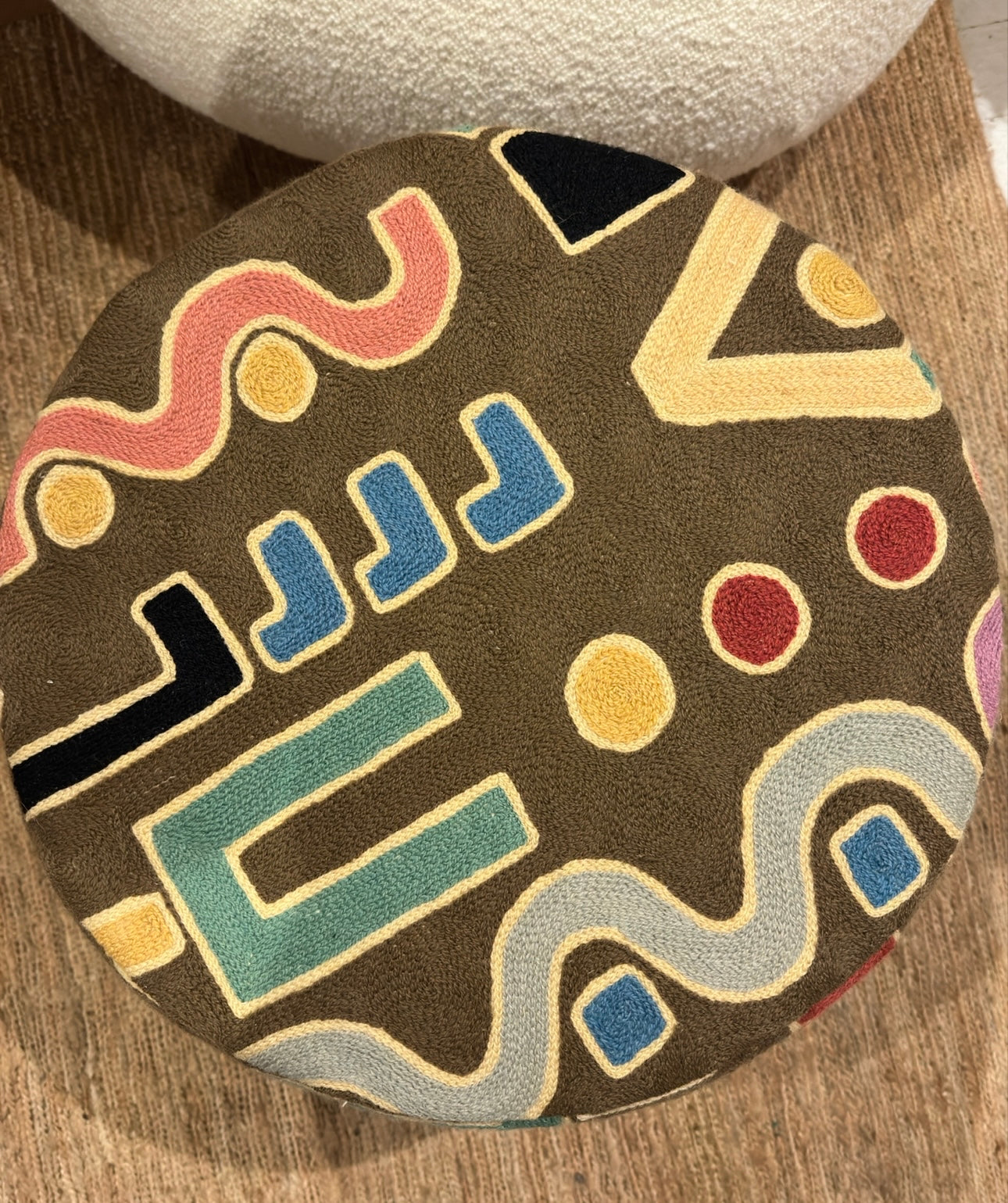 Embroidered pouf