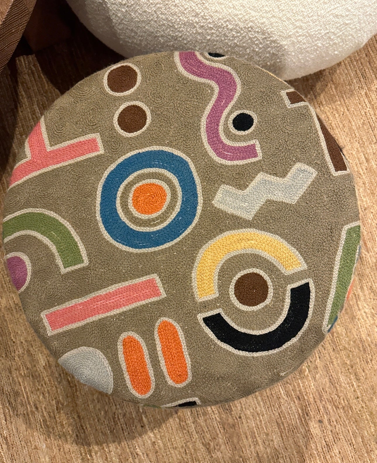 Embroidered pouf
