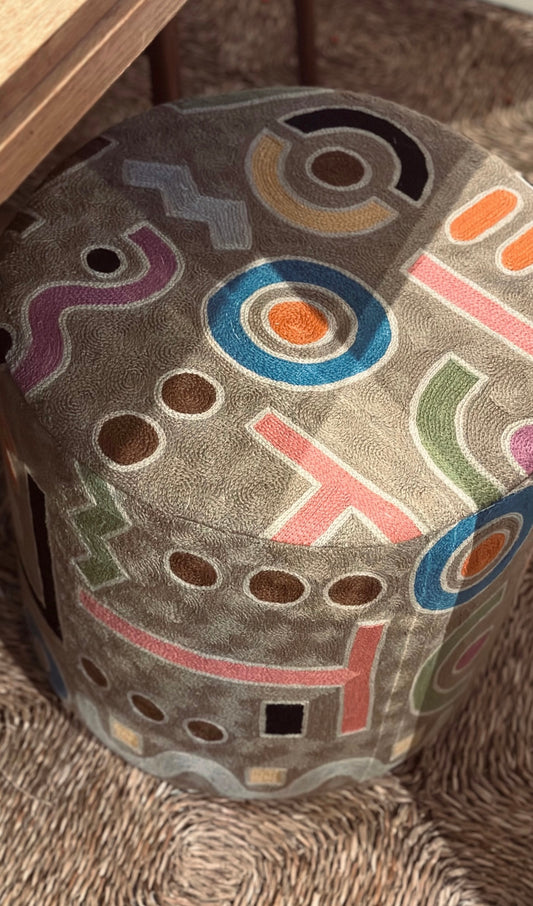 Embroidered pouf